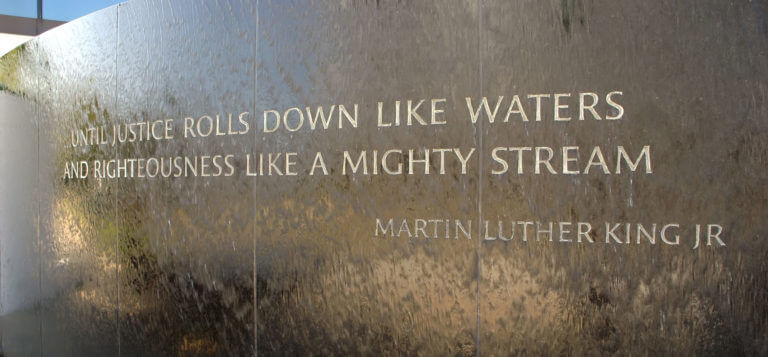 Dramatic quote from Dr King engraved on a wall